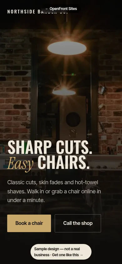 Sample barber shop website design on a phone